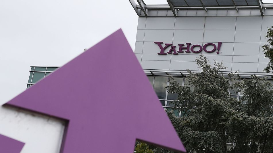 The Yahoo logo is displayed in front of the Yahoo headqarters