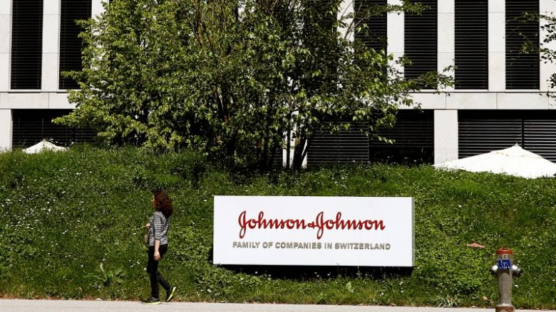 The logo of healthcare company Johnson & Johnson is seen in front of an office building in Zug Switzerland