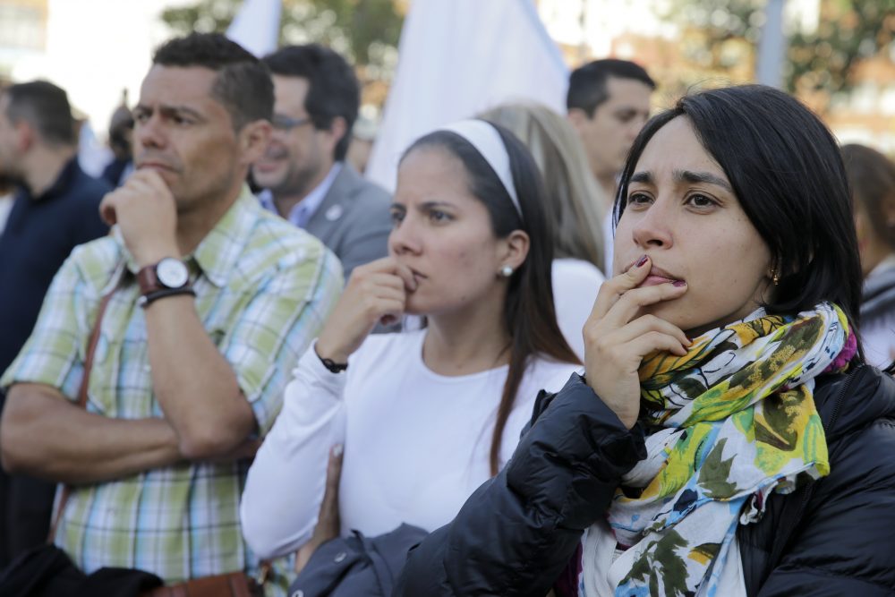 Supporters of the peace accord between the Colombian government and rebels of the Revolutionary Armed Forces of Colombia FARC follow on a giant screen the results of a referendum to decide whether or not to support the peace accord in Bogota Colombia